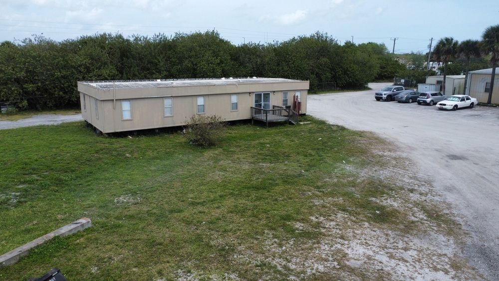 Heavy Industrial Property - 4 Acres Lay Up Yard, Warehouse, Office : 5101 W Eau Gallie Blvd, Melbourne, FL 32934